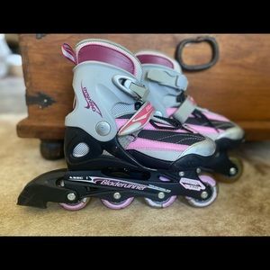Women’s Bladerunner Adjustable-Size Rollerblades. Adjust to women’s sizes 4-7.
